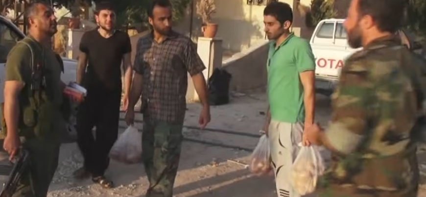 İran destekli Şii milisler Suriye'de halka ait ekmeklere el koydu