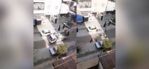 Esed rejimi kontrolündeki Halep'te halk ekmek dağıtan arabaların peşinde koşuyor